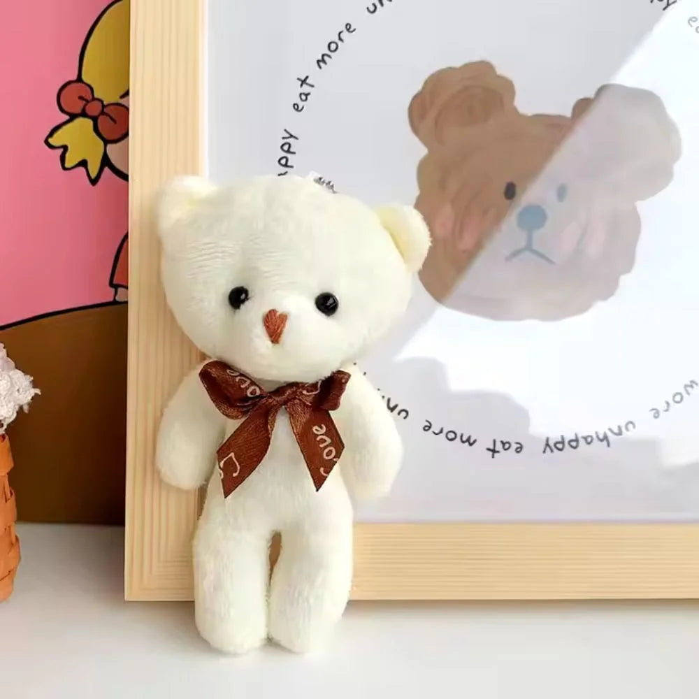 Llavero de peluche animado de osito a cuadros, bonito y suave, regalo de Navidad cómodo y agradable al tacto.