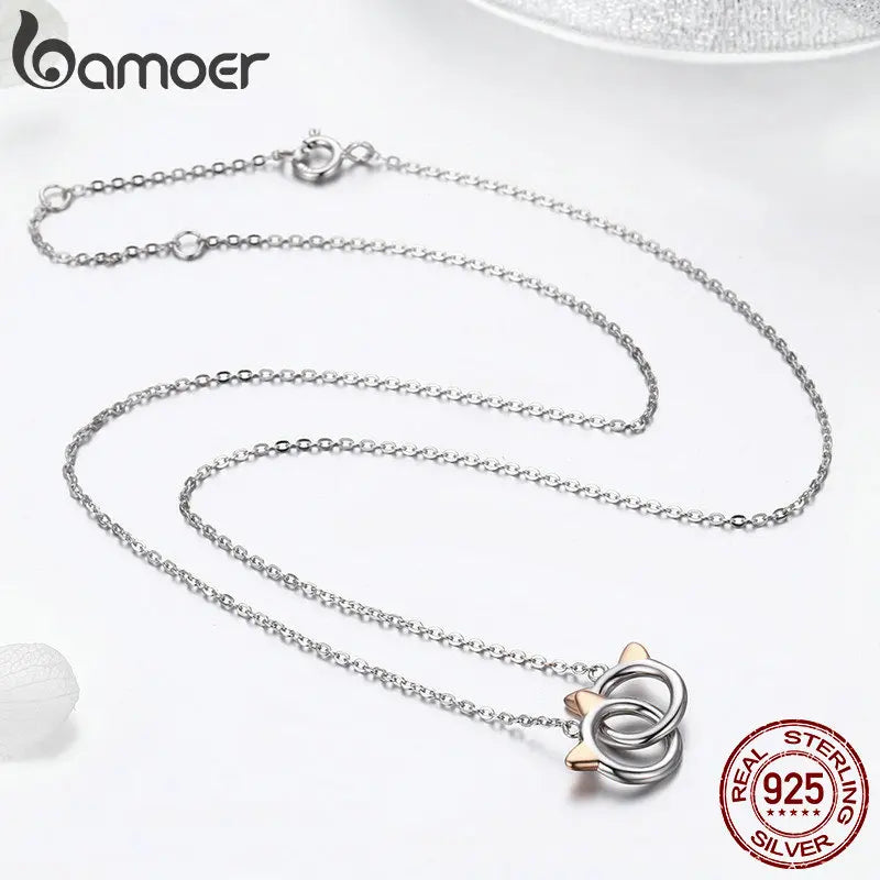 Necklace with cat pendant and double circles