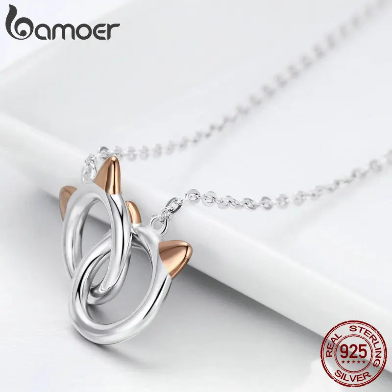 Necklace with cat pendant and double circles