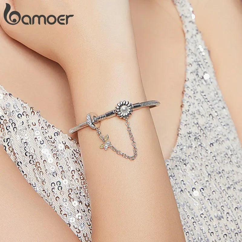Bracelet with snake chain and sunflower detail