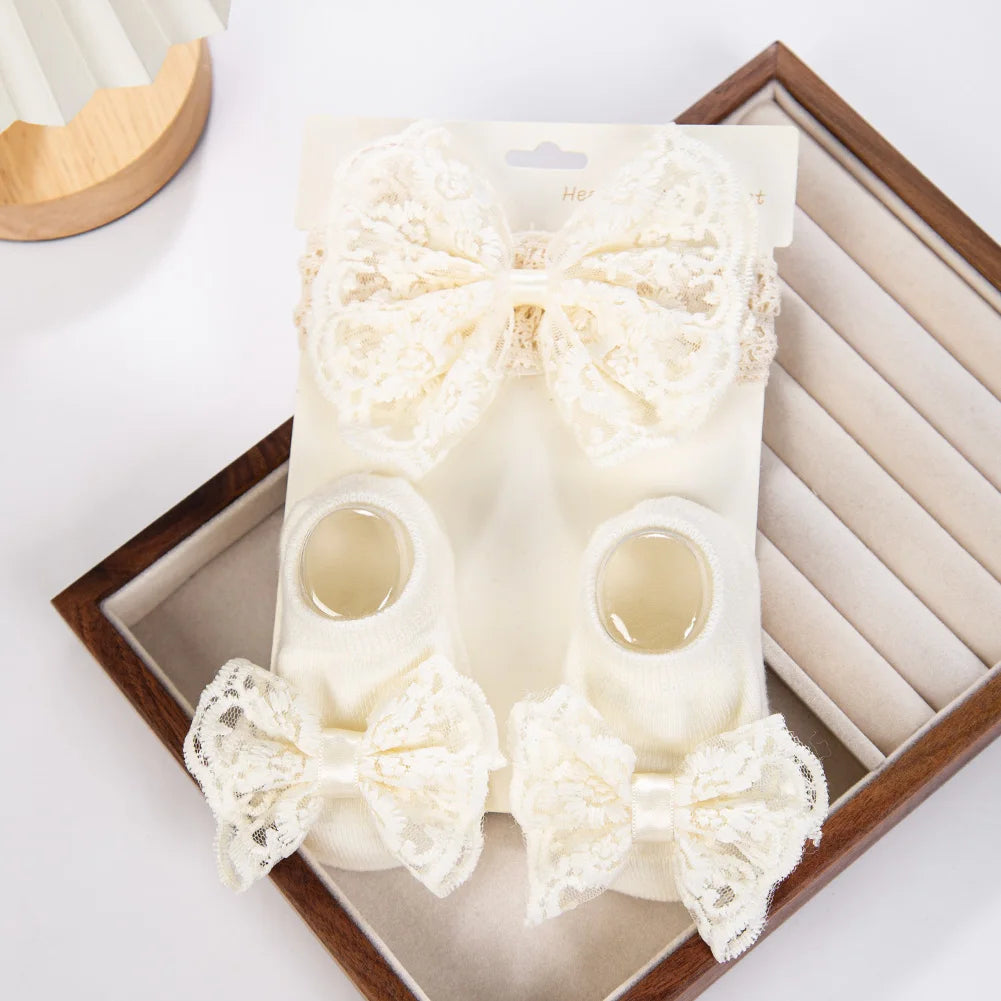 Set per neonata con fascia per capelli e calze decorative