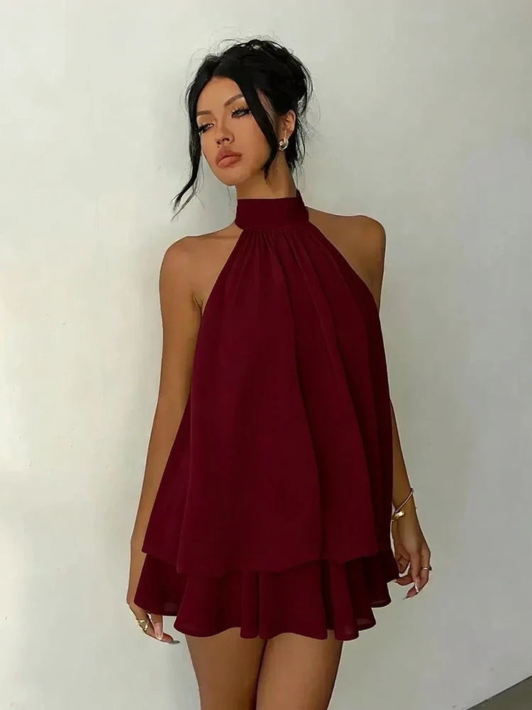 Mini abito da donna con scollo halter e dettagli arricciati