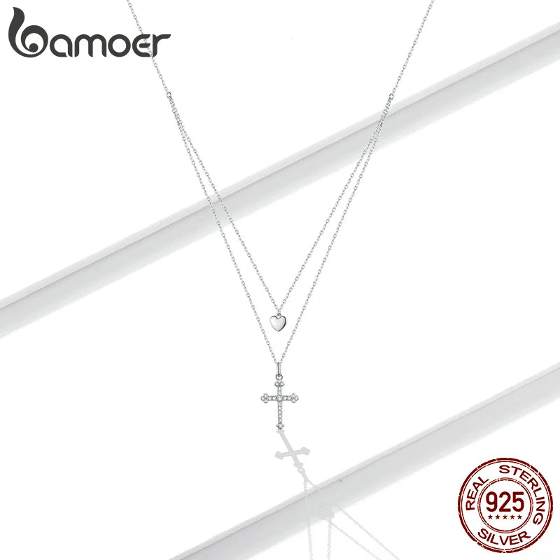 Collana con pendente a croce e cuore