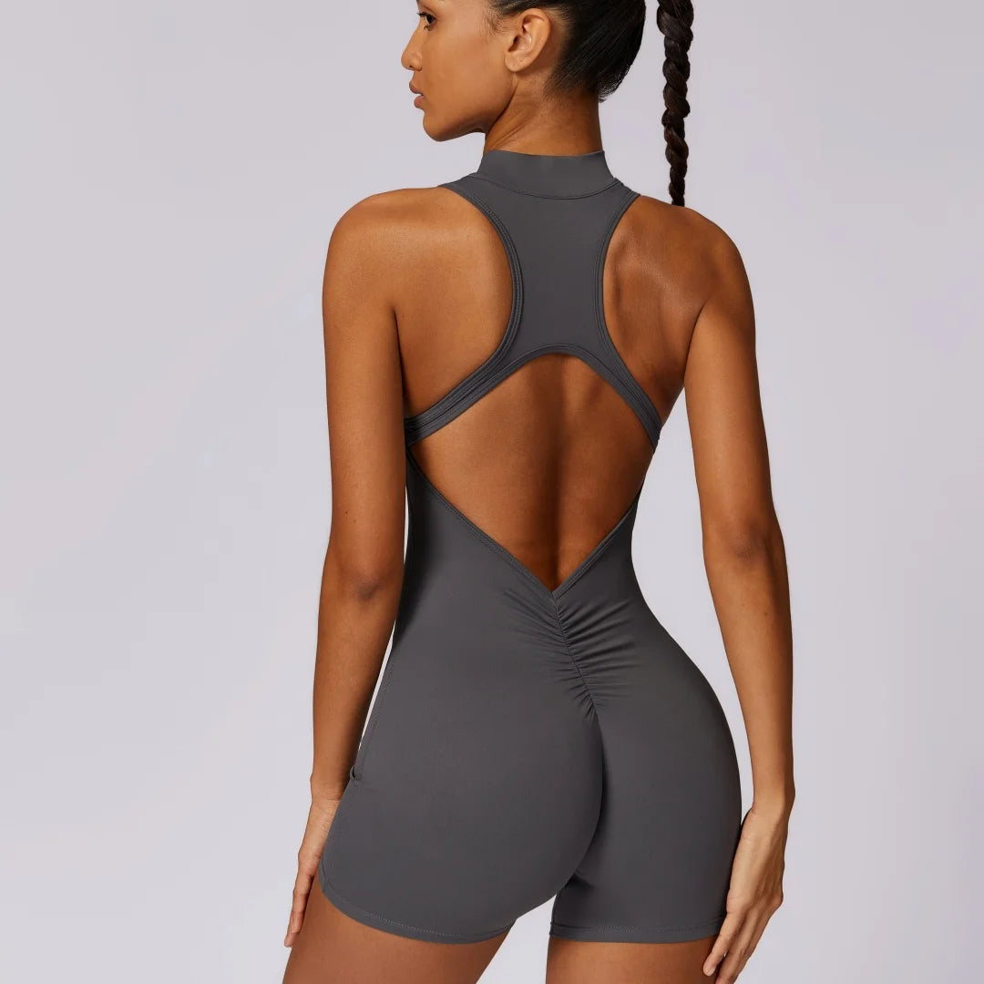 Tuta sportiva corta donna, schiena scoperta, zip