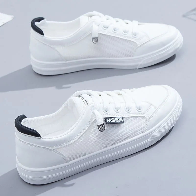 Sneaker bianche da donna in mesh con lacci
