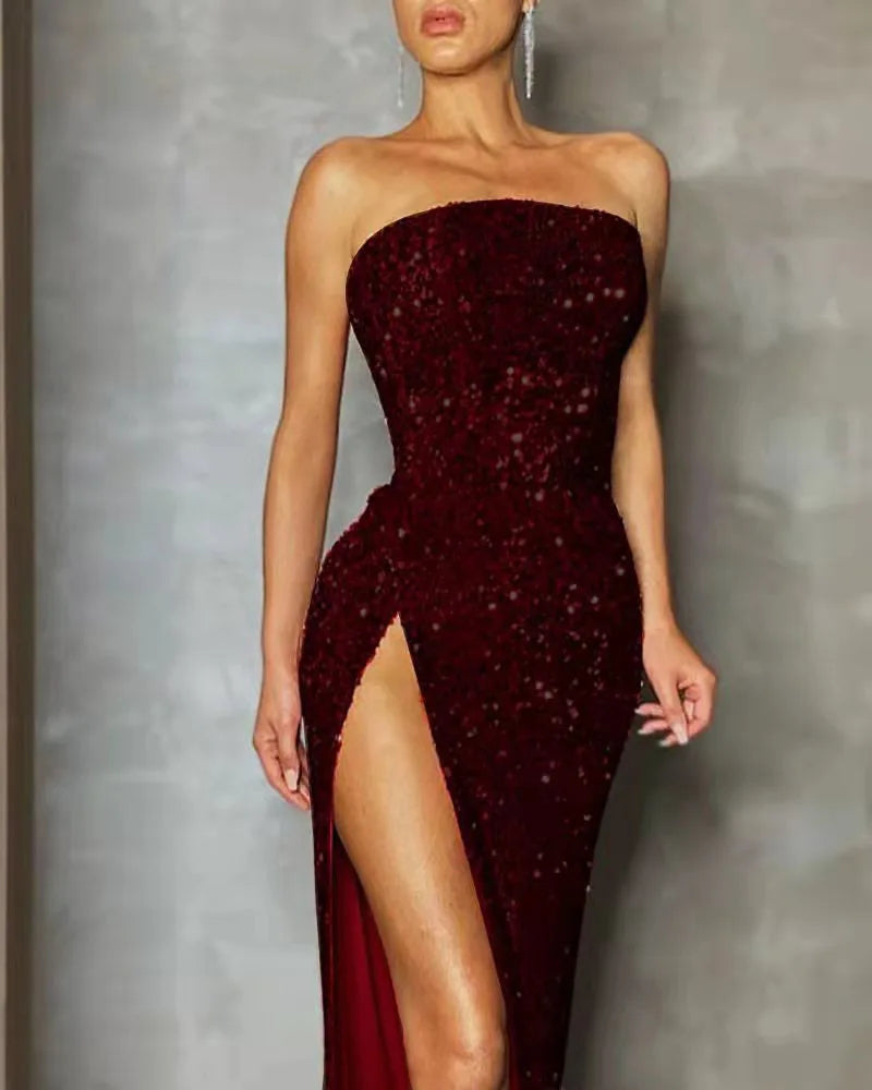 Sleeveless evening dress with asymmetrical neckline