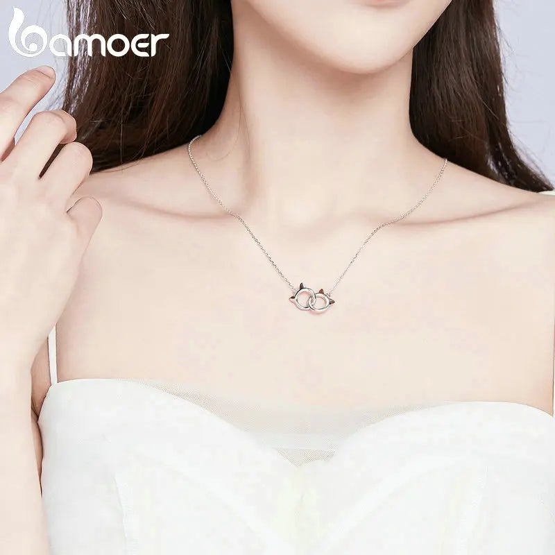 Necklace with cat pendant and double circles