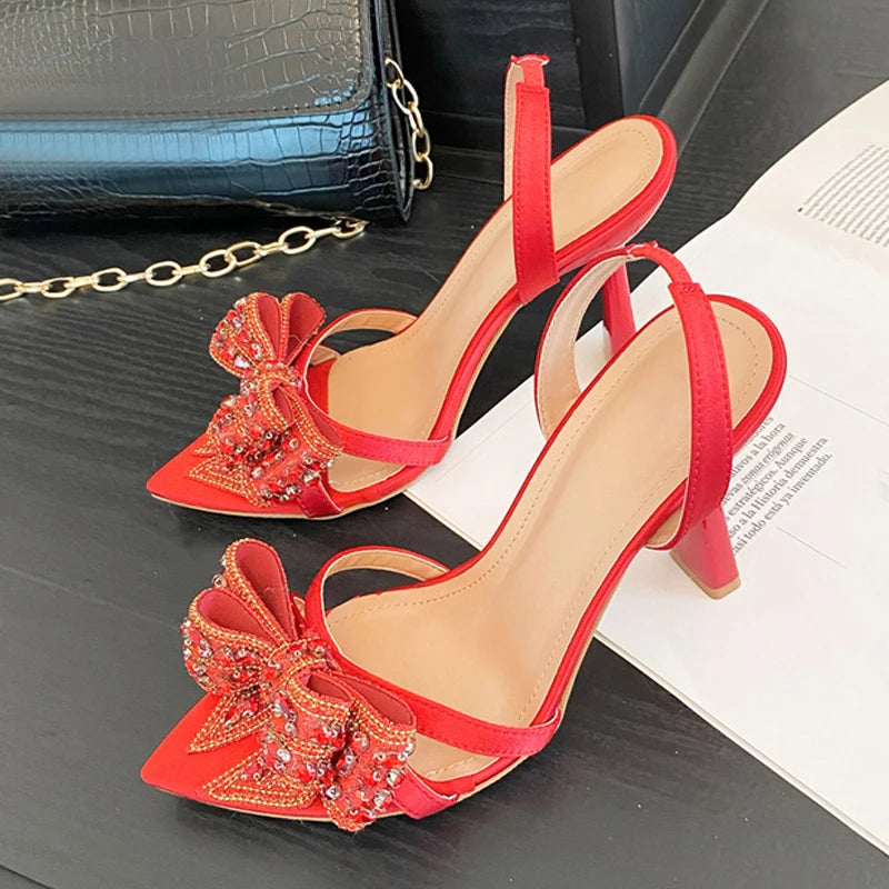 Sandali slingback donna Liyke a punta con fiocco luminoso