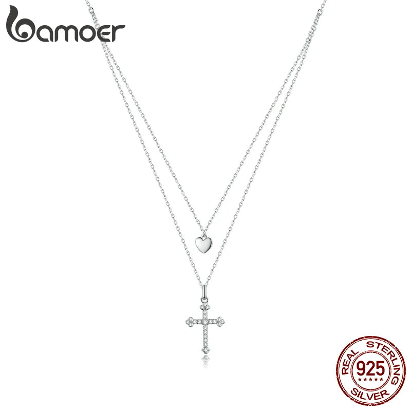 Collana con pendente a croce e cuore