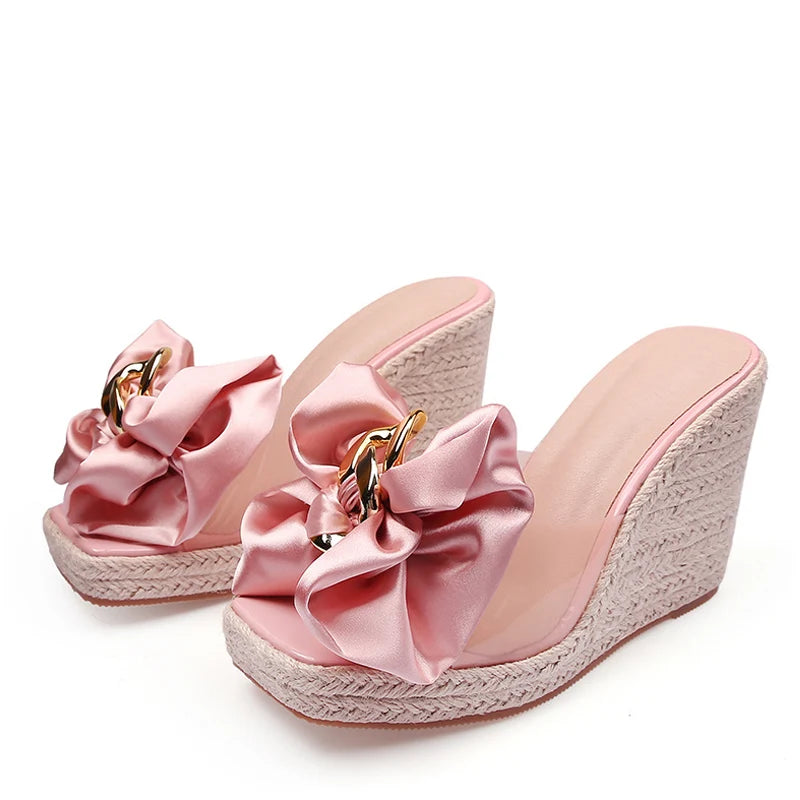 Mules donna Liyke con zeppa intrecciata e fiocco