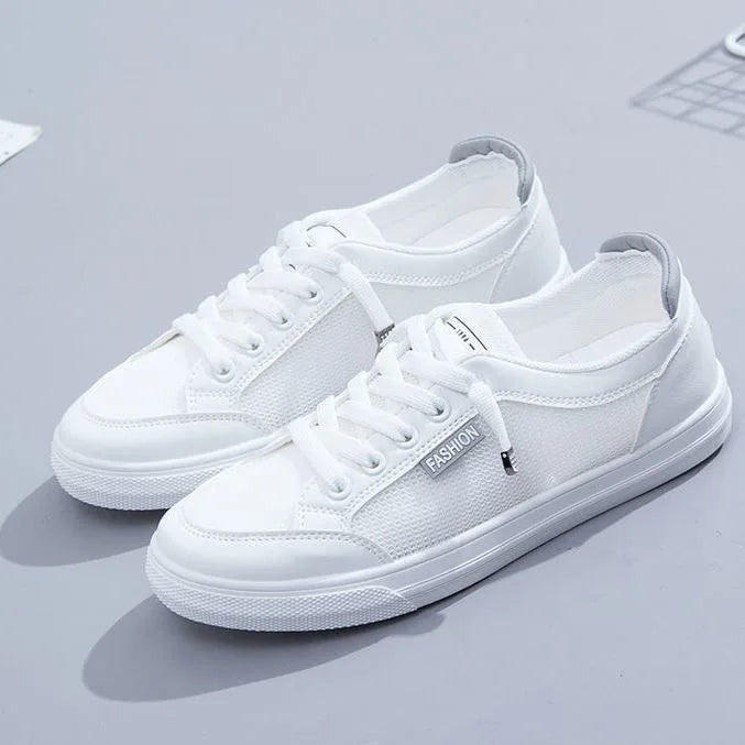 Sneaker bianche da donna in mesh con lacci