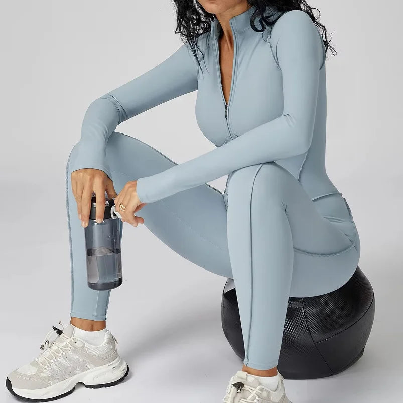 Tuta intera sportiva donna con maniche lunghe e zip