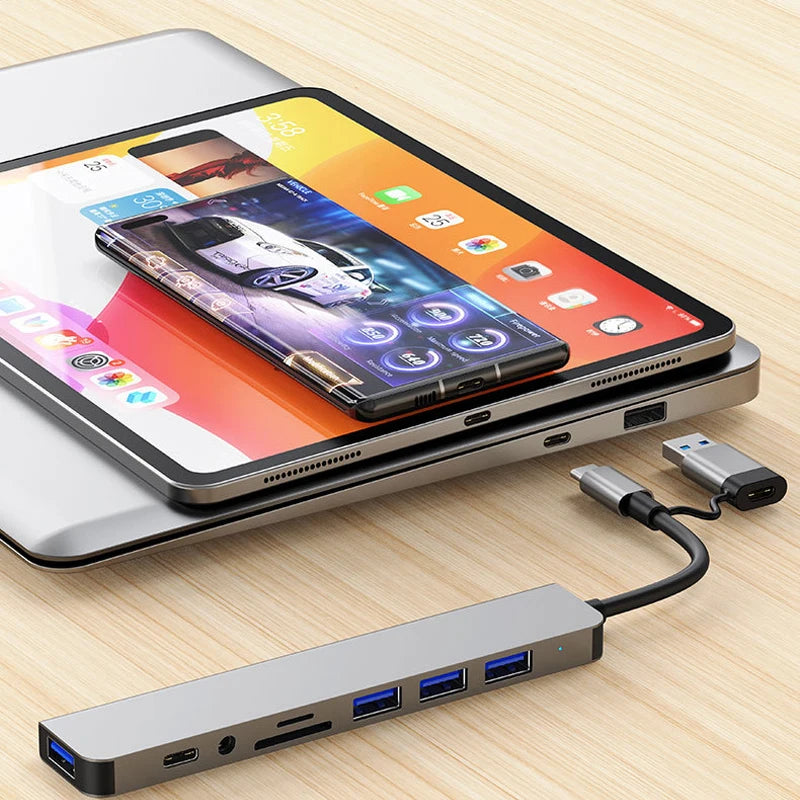 Concentrateur USB-A et USB-C avec audio 3,5 mm et lecteur de cartes SD/TF