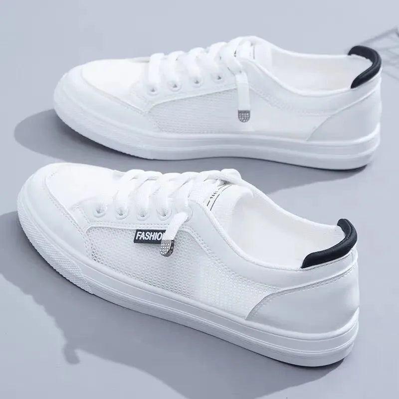 Sneaker bianche da donna in mesh con lacci