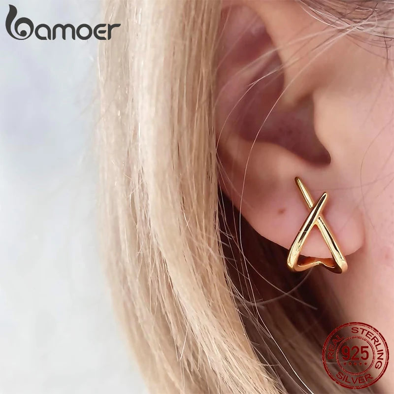 X-motif stud earrings