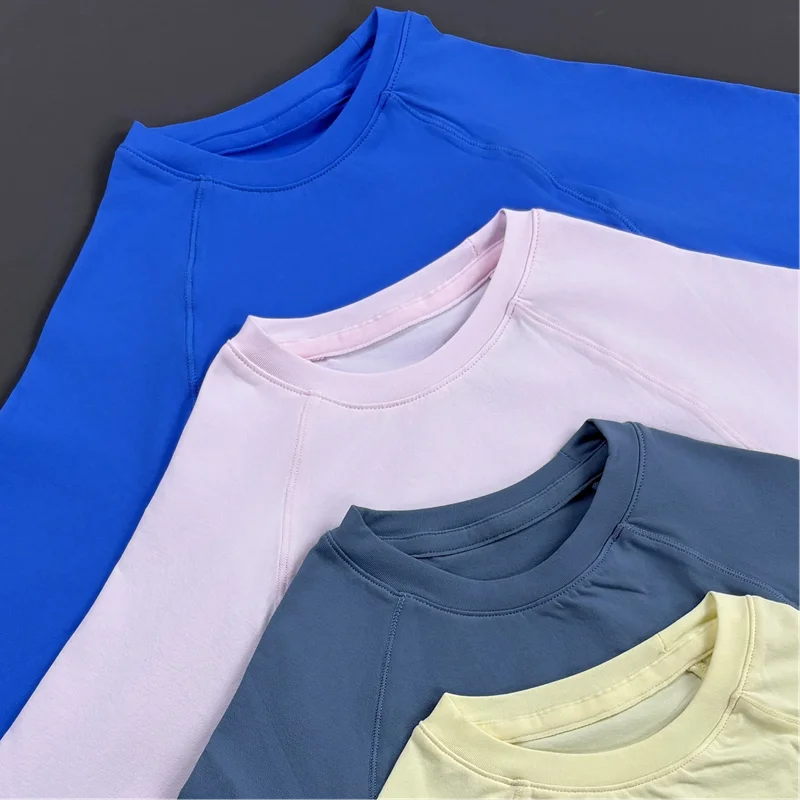 Maglia sportiva donna, maniche lunghe e asole per pollici