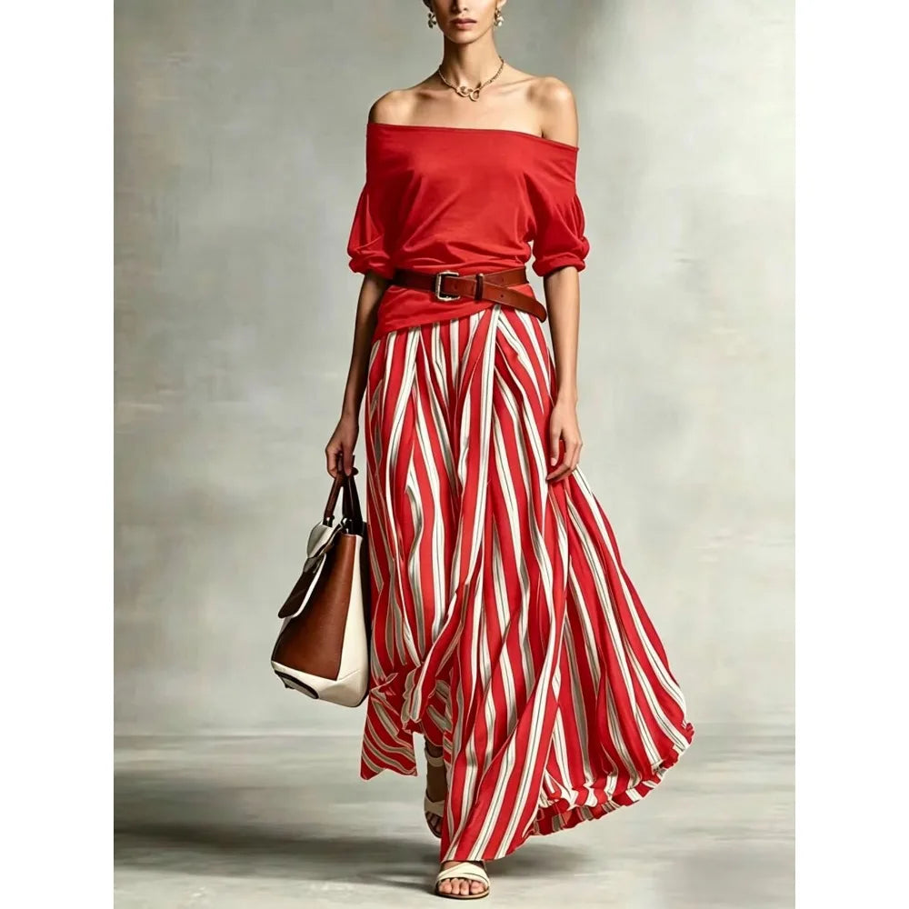 Completo da donna con top a maniche a sbuffo e gonna lunga a righe