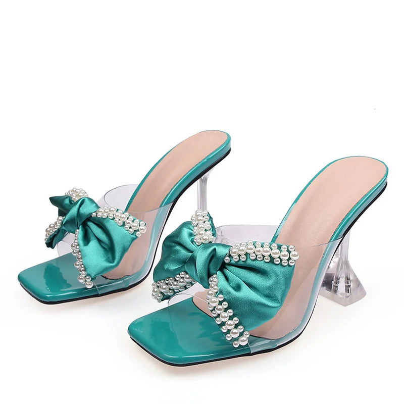 Sandali mules donna Liyke trasparenti con fiocco e tacco scultoreo