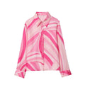 Completo da donna con camicia a fantasia e gonna lunga