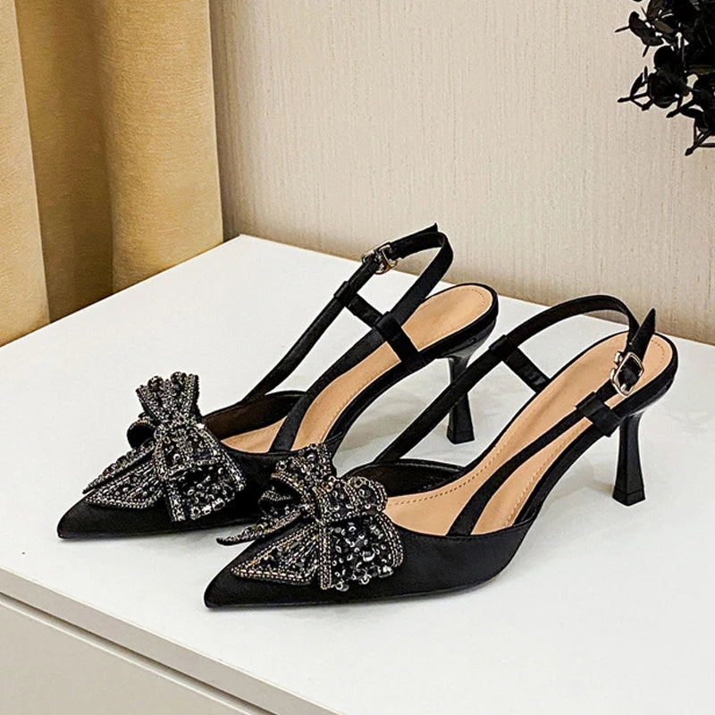 Slingback donna Liyke a punta con fiocco luminoso