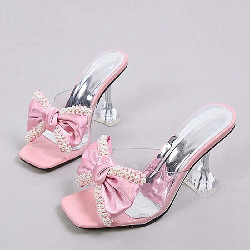 Sandali mules donna Liyke trasparenti con fiocco e tacco scultoreo