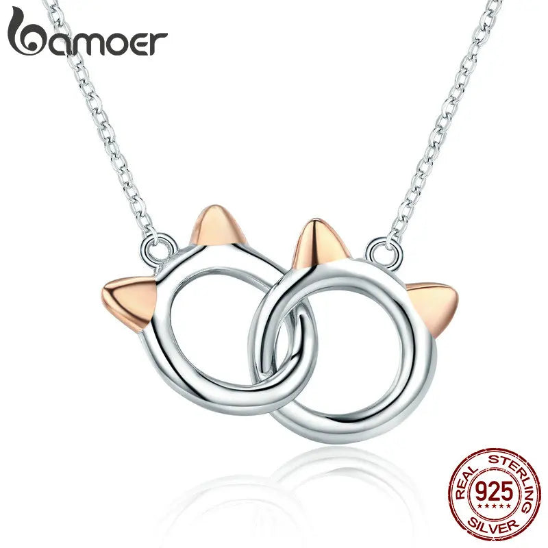 Necklace with cat pendant and double circles