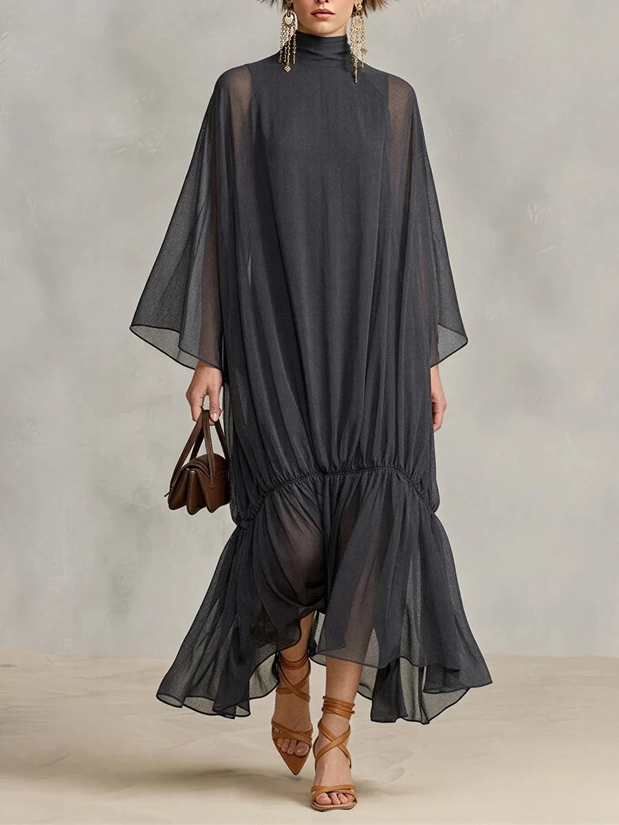 Abito lungo in chiffon semitrasparente con maniche a pipistrello