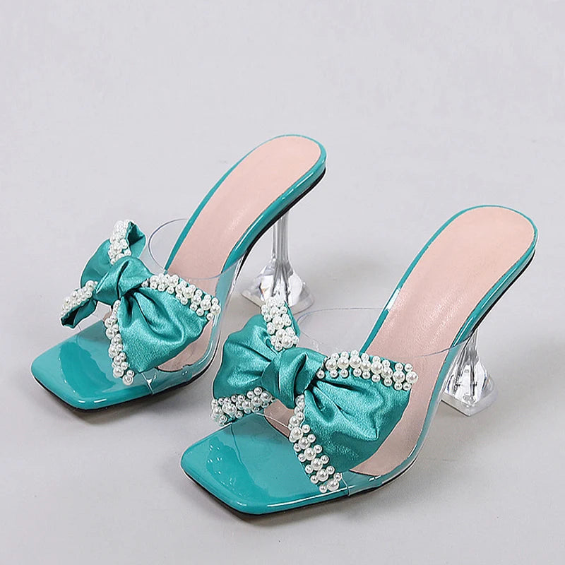Sandali mules donna Liyke trasparenti con fiocco e tacco scultoreo
