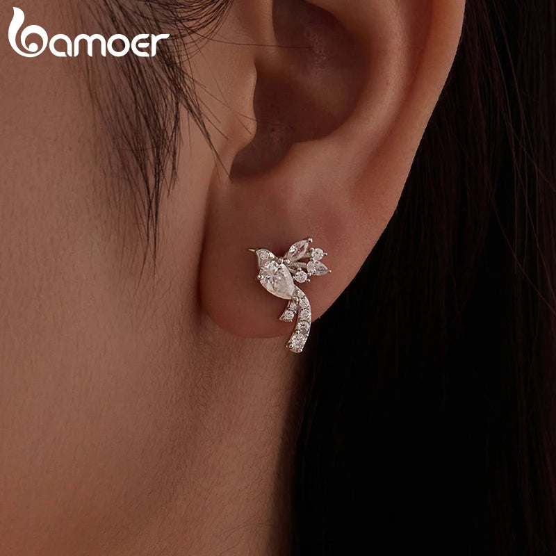 Bird motif stud earrings