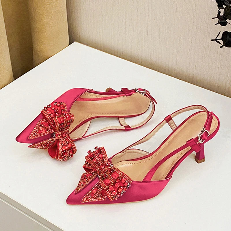 Slingback donna Liyke a punta con fiocco luminoso