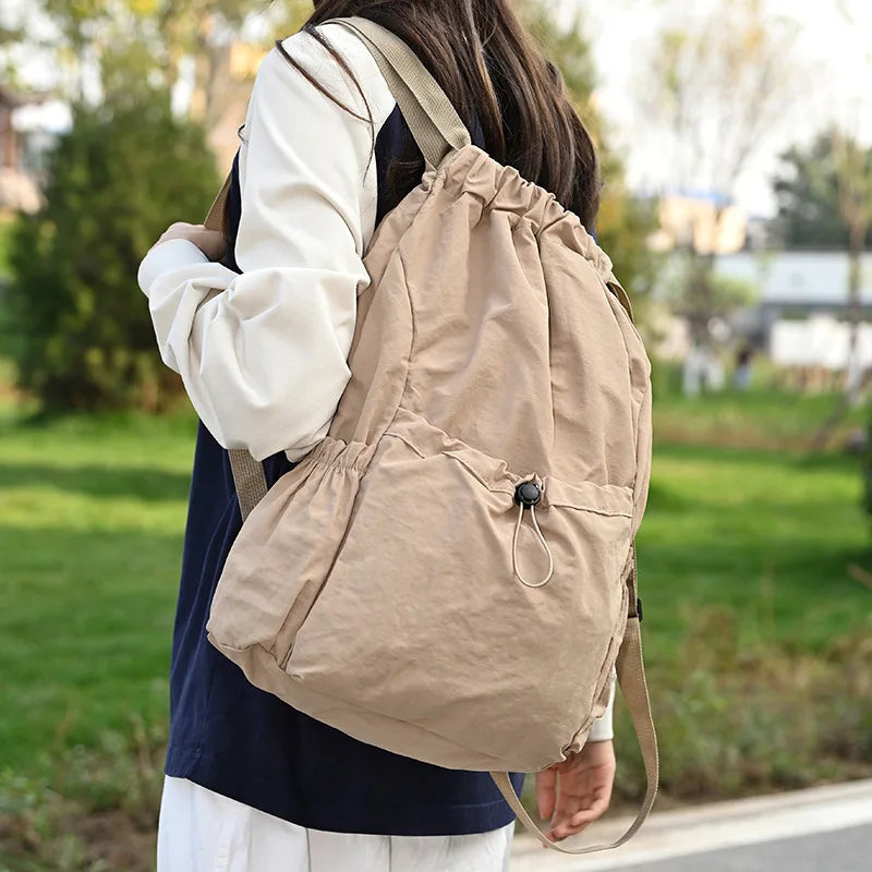 Sac à dos à cordon léger et tendance : sac de sport imperméable à grande capacité pour l'école, les livres, les activités de plein air, les voyages