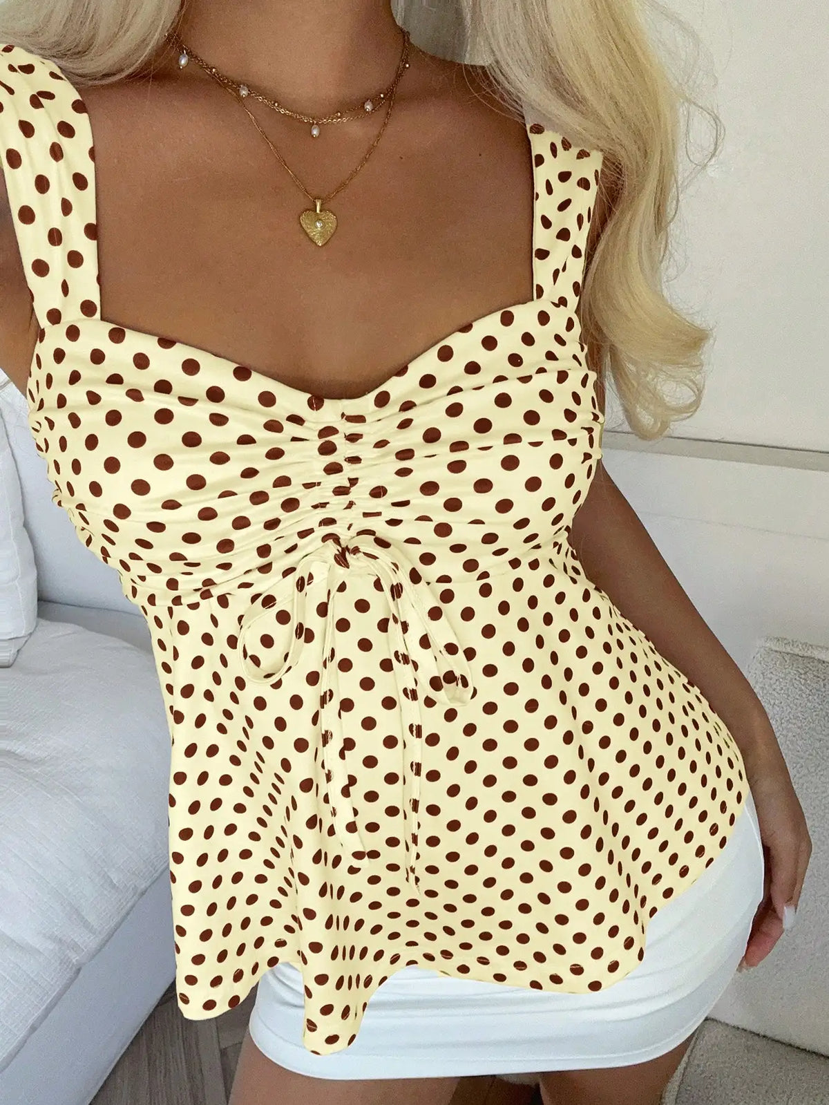 Canotta gialla da donna a pois con fiocco