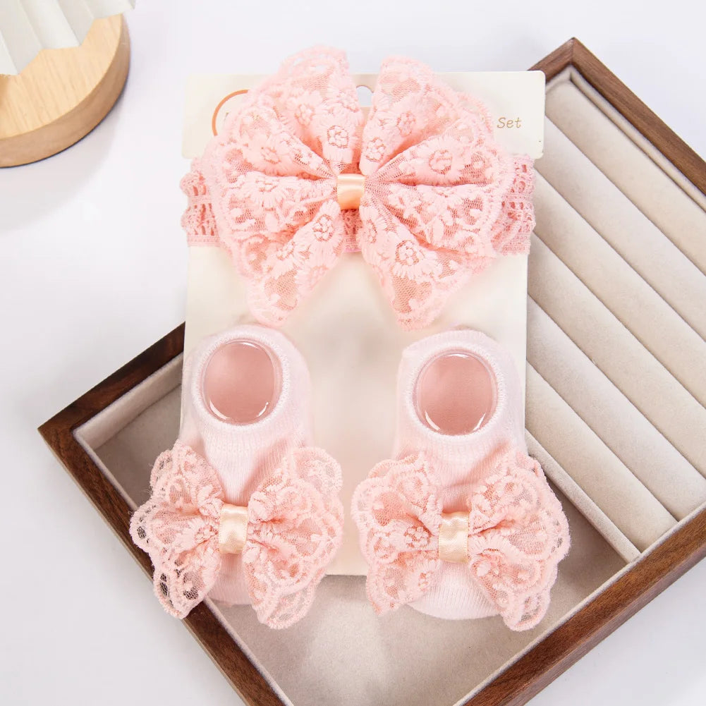 Set per neonata con fascia per capelli e calze decorative