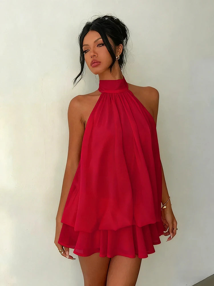 Mini abito da donna con scollo halter e dettagli arricciati