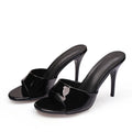 Mules donna Liyke lucide con fascia ampia e tacco