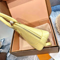 Yellow smooth calf leather handbag, with gold-tone lock hardware, top handle, detachable matching crossbody strap, small shell shoulder bag.