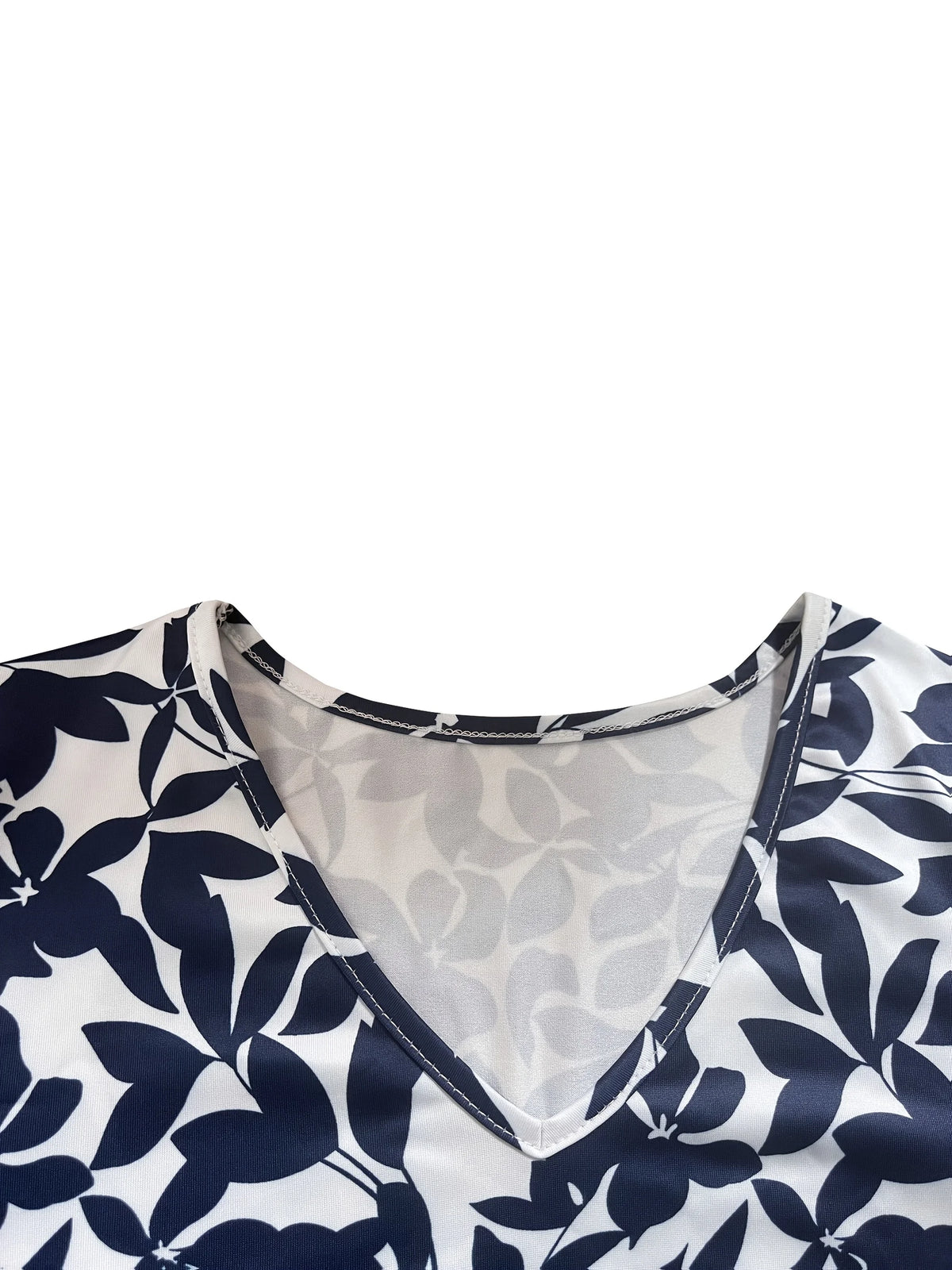 Abito blu da donna con stampa a foglie e scollo a V