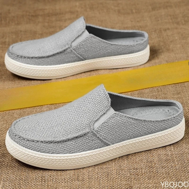 Chaussures d’été pour homme en toile, respirantes, unies, polyvalentes et confortables, légères, de type mocassins ouverts à l’arrière.